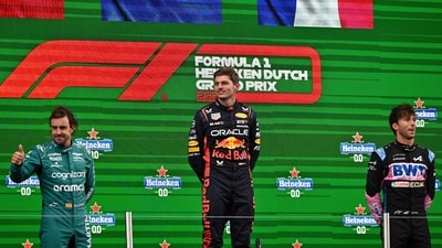 Second-placed Aston Martin's Spanish driver Fernando Alonso (L), first-placed Red Bull Racing's Dutch driver Max Verstappen and third-placed Alpine's French driver Pierre Gasly celebrate on the podium after the Dutch Formula One Grand Prix race (AFP) Second-placed Aston Martin's Spanish driver Fernando Alonso (L), first-placed Red Bull Racing's Dutch driver Max Verstappen and third-placed Alpine's French driver Pierre Gasly celebrate on the podium after the Dutch Formula One Grand Prix race (AFP)