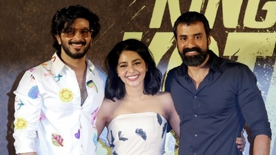 Dulquer Salmaan, Aishwarya Lekshmi and Shabeer Kallarakkal pose during the promotion of their promotion of their film King of Kotha in Mumbai. (ANI)