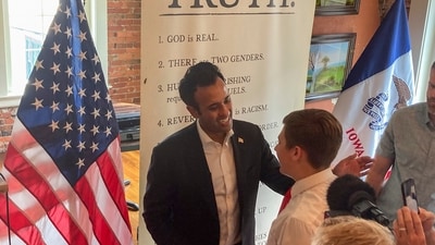 Republican presidential candidate businessman Vivek Ramaswamy greets people at a campaign stop in Pella, Iowa, Friday, Aug. 25, 2023. (AP Photo/Thomas Beaumont) (AP) Republican presidential candidate businessman Vivek Ramaswamy greets people at a campaign stop in Pella, Iowa, Friday, Aug. 25, 2023. (AP Photo/Thomas Beaumont) (AP)