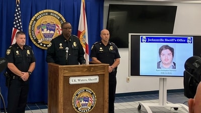 The photograph of Ryan Christopher Palmeter, 21, is shown at a news conference after being identified by Sheriff T.K. Waters as the white man who killed three Black people before shooting himself at a Dollar General store August 26, in what local law enforcement described as a racially motivated crime in Jacksonville, Florida, U.S. August 27, 2023. (via REUTERS)