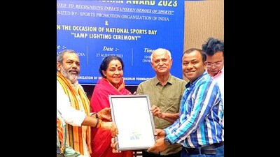 Indranil Ghosh (striped shirt) receiving the award on behalf of NFA-Prayagraj in New Delhi on Sunday. (Sourced)