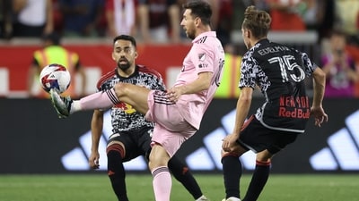 Lionel Messi attempts to control the ball against Daniel Edelman (AFP) Lionel Messi attempts to control the ball against Daniel Edelman (AFP)