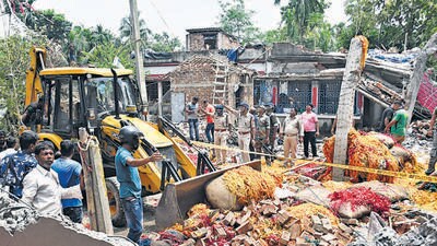Rescue operation underway after a massive explosion at allegedly illegal firecrackers factory at Duttapukur, North 24 parganas district of West Bengal, India on Sunday, August 27, 2023. At least 7 people are killed and several houses are damaged due to the blast (HT photo) Rescue operation underway after a massive explosion at allegedly illegal firecrackers factory at Duttapukur, North 24 parganas district of West Bengal, India on Sunday, August 27, 2023. At least 7 people are killed and several houses are damaged due to the blast (HT photo)