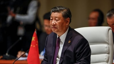 President of China Xi Jinping attends a session. (AFP)