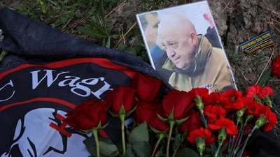 A view shows a portrait of Wagner mercenary chief Yevgeny Prigozhin at a makeshift memorial near former PMC Wagner Centre in Saint Petersburg, Russia. (REUTERS)