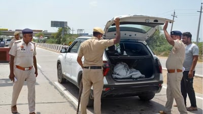 Police check vehicles in Nuh and other areas. (PTI) Police check vehicles in Nuh and other areas. (PTI)