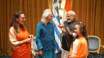 PM Modi is enjoying a rendition of Mohammed Rafi's classic melody by a talented Greek family. (X/@narendramodi) PM Modi is enjoying a rendition of Mohammed Rafi's classic melody by a talented Greek family. (X/@narendramodi)