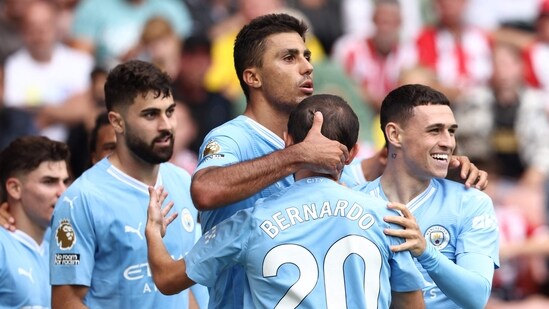 Spanish midfielder #16 Rodri (C) celebrates his go-ahead goal with Manchester City's Portuguese midfielder #20 Bernardo Silva (AFP)