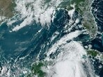 This image obtained from the National Oceanic and Atmospheric Administration (NOAA), shows tropical Storm Idalia (bottom right) approaching Cuba on August 28, 2023. Tropical Storm Idalia strengthened as it neared Cuba and the abnormally hot waters of the Gulf of Mexico on Monday, with forecasters predicting it could become a major hurricane before roaring ashore in Florida this week. This image obtained from the National Oceanic and Atmospheric Administration (NOAA), shows tropical Storm Idalia (bottom right) approaching Cuba on August 28, 2023. Tropical Storm Idalia strengthened as it neared Cuba and the abnormally hot waters of the Gulf of Mexico on Monday, with forecasters predicting it could become a major hurricane before roaring ashore in Florida this week.