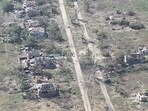 Ukrainian soldiers enter the village of Robotyne, Zaporizhzhia region, Ukraine, in this screengrab taken from a handout video released on August 25, 2023. 