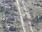 Ukrainian soldiers of the Separate Assault Battalion 'Skala' enter the embattled village of Robotyne, Zaporizhzhia region, Ukraine. (Reuters)