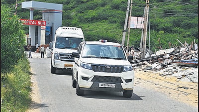 A police vehicle escorts a tempo traveller with Hindu leaders through Nuh. (Parveen Kumar/ht photo) A police vehicle escorts a tempo traveller with Hindu leaders through Nuh. (Parveen Kumar/ht photo)