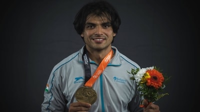 Men's javelin throw gold medallist India's Neeraj Chopra poses for portraits during a studio photo session on the sidelines of the World Athletics Championships in Budapest. (AFP)
