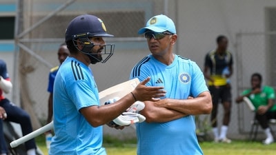 Rohit Sharma (L) and Rahul Dravid (R), of India, take part in a training session (AFP) Rohit Sharma (L) and Rahul Dravid (R), of India, take part in a training session (AFP)