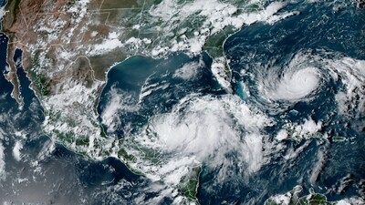 This image obtained from the National Oceanic and Atmospheric Administration (NOAA), shows ropical Storm Idalia (C) off the coast of Mexico on August 279, 2023, at 21:20:20 UTC. Tropical Storm Idalia formed August 27 in the Caribbean, buffeting southeastern Mexico with wind and rain, as forecasters predicted it will strengthen to a hurricane before reaching Florida later in the week. (AFP) This image obtained from the National Oceanic and Atmospheric Administration (NOAA), shows ropical Storm Idalia (C) off the coast of Mexico on August 279, 2023, at 21:20:20 UTC. Tropical Storm Idalia formed August 27 in the Caribbean, buffeting southeastern Mexico with wind and rain, as forecasters predicted it will strengthen to a hurricane before reaching Florida later in the week. (AFP)