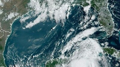 This image obtained from the National Oceanic and Atmospheric Administration (NOAA), shows tropical Storm Idalia (bottom right) approaching Cuba on August 28, 2023. Tropical Storm Idalia strengthened as it neared Cuba and the abnormally hot waters of the Gulf of Mexico on Monday, with forecasters predicting it could become a major hurricane before roaring ashore in Florida this week. (AFP) This image obtained from the National Oceanic and Atmospheric Administration (NOAA), shows tropical Storm Idalia (bottom right) approaching Cuba on August 28, 2023. Tropical Storm Idalia strengthened as it neared Cuba and the abnormally hot waters of the Gulf of Mexico on Monday, with forecasters predicting it could become a major hurricane before roaring ashore in Florida this week. (AFP)