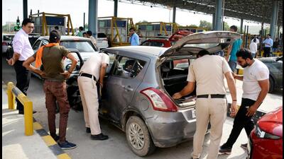 Police checking vehicles on the eve of the VHP's yatra. (PTI) Police checking vehicles on the eve of the VHP's yatra. (PTI)