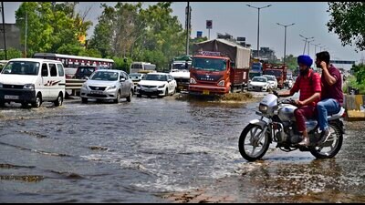 Water logging at Sherpur Chowk after morning showers in Ludhiana on Monday. (Gurpreet Singh/HT)