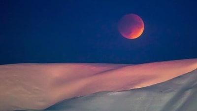 A super blue blood moon behind a mountain is seen from Longyearbyen, Norway. (AFP file) A super blue blood moon behind a mountain is seen from Longyearbyen, Norway. (AFP file)