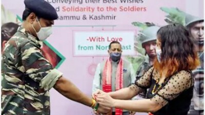 A girl ties Rakhi on a Jawan's wrist. (ANI File) A girl ties Rakhi on a Jawan's wrist. (ANI File)