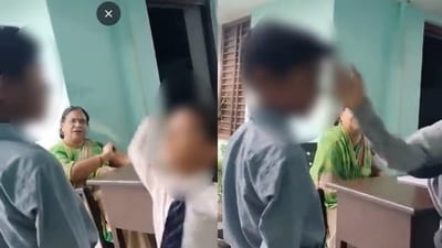The students took turns slapping their fellow student even as the teacher watched on. (Screengrab) The students took turns slapping their fellow student even as the teacher watched on. (Screengrab)