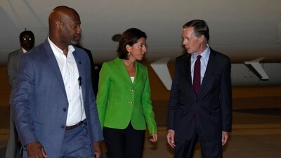 Commerce Secretary Gina Raimondo, center, talks to U.S. Ambassador to China Nicholas Burns, right, as she arrives at the Beijing Capital International Airport in Beijing, Sunday. (AP) Commerce Secretary Gina Raimondo, center, talks to U.S. Ambassador to China Nicholas Burns, right, as she arrives at the Beijing Capital International Airport in Beijing, Sunday. (AP)