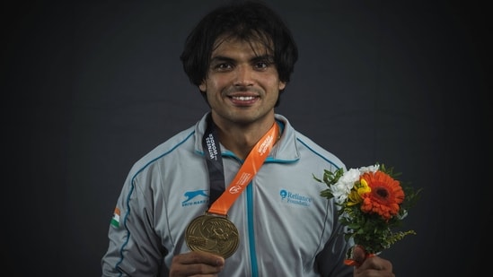 Men's javelin throw gold medallist India's Neeraj Chopra poses for portraits during a studio photo session on the sidelines of the World Athletics Championships in Budapest. (AFP)