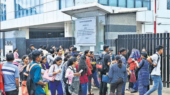 Mumbai, India - Aug 28, 2023 : Students who are reaching to appear for the Talathi exam are not allowed to enter the examination centre even though they have reached two minutes before reporting time. As per the rules students are allowed to enter the examination centre five minutes before the actual exam starts. Around 25 students are protesting outside the TCS examination centre, Filtar Pada Road, Powai, in Mumbai, India, Monday, Aug 28, 2023. (Photo by Vijay Bate/HT Photo)