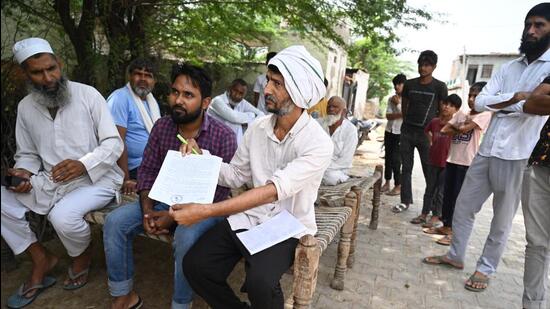 Residents of Muradbas village near Nalhar temple had installed barricades at entry and exit routes on Monday. (Parveen Kumar/HT Photo)