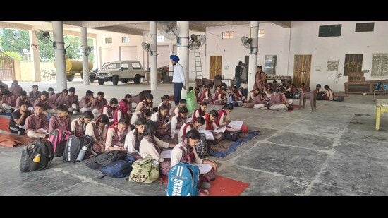 Students attending classes at a gurdwara in Ludhiana on Monday. (Gurpreet Singh/HT)