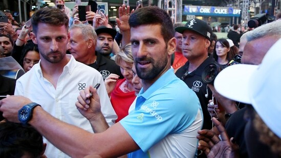 Serbian tennis player Novak Djokovic meets with fans after playing at a pop-up tennis court during a US Open tennis event at Times Square in New York on August 24 (AFP)
