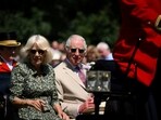 Britain's King Charles III and Queen Camilla arrive by horse drawn carriage for a visit to the Sandringham Flower Show. Britain's King Charles III and Queen Camilla arrive by horse drawn carriage for a visit to the Sandringham Flower Show.
