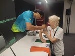 Neeraj Chopra gives autograph