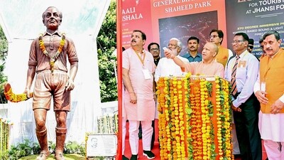 Uttar Pradesh Chief Minister Yogi Adityanath unveils a statue of hockey legend Major Dhyan Chand on the occasion of his birth anniversary observed as 'National Sports Day', in Jhansi on Tuesday. (ANI Photo) (Yogi Adityanath Twitter) Uttar Pradesh Chief Minister Yogi Adityanath unveils a statue of hockey legend Major Dhyan Chand on the occasion of his birth anniversary observed as 'National Sports Day', in Jhansi on Tuesday. (ANI Photo) (Yogi Adityanath Twitter)