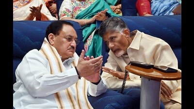 BJP national president JP Nadda interacts with former Andhra Pradesh chief minister N. Chandrababu Naidu during the release of the commemorative coin on legendary actor-politician NT Rama Rao on his birth centenary celebration, at Rashtrapati Bhavan Cultural Centre, in New Delhi on Monday. (ANI)