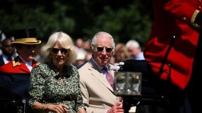 Britain's King Charles III and Queen Camilla arrive by horse drawn carriage for a visit to the Sandringham Flower Show. (AP) Britain's King Charles III and Queen Camilla arrive by horse drawn carriage for a visit to the Sandringham Flower Show. (AP)