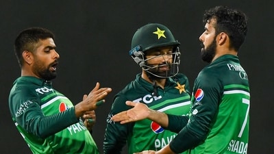 Pakistan's captain Babar Azam (L) celebrates with teammates after the dismissal of Afghanistan's Hashmatullah Shahidi (not pictured) during the third and final one-day international (ODI) cricket match between Pakistan and Afghanistan (AFP) Pakistan's captain Babar Azam (L) celebrates with teammates after the dismissal of Afghanistan's Hashmatullah Shahidi (not pictured) during the third and final one-day international (ODI) cricket match between Pakistan and Afghanistan (AFP)