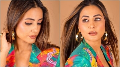 Hina accessorised the ensemble with striking accessories, including gold hoop earrings in geometric cut-outs, statement rings, and white pumps featuring high heels. (Instagram) Hina accessorised the ensemble with striking accessories, including gold hoop earrings in geometric cut-outs, statement rings, and white pumps featuring high heels. (Instagram)