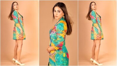 The mini blazer dress comes in a relaxed fit and multiple hues of green, orange, yellow, blue, pink, and purple hues. It features intricate thread and sequin embroidery, a tapered waist, notched lapels, a plunging neckline, front button closures, quarter-length sleeves, padded shoulders, a mini hem length, and a slit at the back for ease. (Instagram) The mini blazer dress comes in a relaxed fit and multiple hues of green, orange, yellow, blue, pink, and purple hues. It features intricate thread and sequin embroidery, a tapered waist, notched lapels, a plunging neckline, front button closures, quarter-length sleeves, padded shoulders, a mini hem length, and a slit at the back for ease. (Instagram)