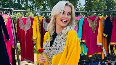 Miss World Karolina Bielawska tries Kashmiri dress during her Jammu and Kashmir visit. (PTI PHOTO) Miss World Karolina Bielawska tries Kashmiri dress during her Jammu and Kashmir visit. (PTI PHOTO)