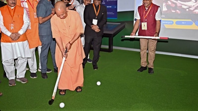 Uttar Pradesh Chief Minister Yogi Adityanath plays hockey during an event on National Sports Day marking the birth anniversary of Indian field hockey player Major Dhyan Chand, in Jhansi, Tuesday. (PTI) Uttar Pradesh Chief Minister Yogi Adityanath plays hockey during an event on National Sports Day marking the birth anniversary of Indian field hockey player Major Dhyan Chand, in Jhansi, Tuesday. (PTI)