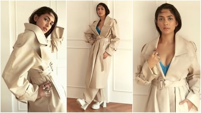 Mrunal Thakur is an absolute stunner who can rock any look to perfection. Be it a sartorial saree or a chic pantsuit, Mrunal knows how to turn heads and her latest look in a stylish trench coat is no exception. Giving a modern twist to the traditional coat look, she once again proves her fashion prowess. (Instagram/@mrunalthakur) Mrunal Thakur is an absolute stunner who can rock any look to perfection. Be it a sartorial saree or a chic pantsuit, Mrunal knows how to turn heads and her latest look in a stylish trench coat is no exception. Giving a modern twist to the traditional coat look, she once again proves her fashion prowess. (Instagram/@mrunalthakur)