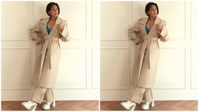 Mrunal's cream faux leather trench coat is from clothing brand Torqadorn and comes with a hefty price tag of <span class='webrupee'>₹</span>12,995. She paired it with a matching pair of trousers. (Instagram/@mrunalthakur) Mrunal's cream faux leather trench coat is from clothing brand Torqadorn and comes with a hefty price tag of <span class='webrupee'>₹</span>12,995. She paired it with a matching pair of trousers. (Instagram/@mrunalthakur)