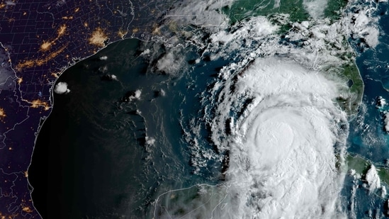 This image obtained from the National Oceanic and Atmospheric Administration (NOAA), shows Hurricane Idalia (C R) moving into the Gulf of Mexico on August 29, 2023, at 12h36UTC. Idalia strengthened into a hurricane on August 29 as forecasters predicted it would intensify and become "extremely dangerous" before making landfall in the US state of Florida. "Idalia now a hurricane. Expected to rapidly intensify into an extremely dangerous major hurricane before landfall on Wednesday," the National Hurricane Center (NHC) said in a 0900GMT public advisory. This image obtained from the National Oceanic and Atmospheric Administration (NOAA), shows Hurricane Idalia (C R) moving into the Gulf of Mexico on August 29, 2023, at 12h36UTC. Idalia strengthened into a hurricane on August 29 as forecasters predicted it would intensify and become "extremely dangerous" before making landfall in the US state of Florida. "Idalia now a hurricane. Expected to rapidly intensify into an extremely dangerous major hurricane before landfall on Wednesday," the National Hurricane Center (NHC) said in a 0900GMT public advisory.