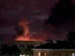 In this grab taken from a handout video posted on the Telegram account of Mikhail Vedernikov, the governor of Russia's Pskov region, on August 30, 2023, an explosion lights up the sky as the Russian military repell a drone attack on an airport in the northwestern city of Pskov. In this grab taken from a handout video posted on the Telegram account of Mikhail Vedernikov, the governor of Russia's Pskov region, on August 30, 2023, an explosion lights up the sky as the Russian military repell a drone attack on an airport in the northwestern city of Pskov.
