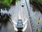 Hurricane Idalia: In this aerial view, vehicles attempt to travel on a flooded road in Tampa, Florida. Hurricane Idalia: In this aerial view, vehicles attempt to travel on a flooded road in Tampa, Florida.