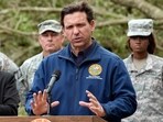 Florida Gov. Ron DeSantis speaks at a news conference Wednesday, Aug. 30, 2023, in Perry, Fla., in the aftermath of Hurricane Idalia. (AP Photo/John Raoux)