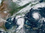 This Tuesday, Aug. 29, 2023, 1:31 p.m. EDT satellite image provided by the National Oceanic and Atmospheric Administration shows Hurricane Idalia, center, approaching Florida's Gulf Coast, and Hurricane Franklin, right, as it moves along the East coast of the United States, southwest of Bermuda. Feeding on some of the hottest water on the planet, Hurricane Idalia is expected to rapidly strengthen as it bears down on Florida and the rest of the Gulf Coast, scientists said. This Tuesday, Aug. 29, 2023, 1:31 p.m. EDT satellite image provided by the National Oceanic and Atmospheric Administration shows Hurricane Idalia, center, approaching Florida's Gulf Coast, and Hurricane Franklin, right, as it moves along the East coast of the United States, southwest of Bermuda. Feeding on some of the hottest water on the planet, Hurricane Idalia is expected to rapidly strengthen as it bears down on Florida and the rest of the Gulf Coast, scientists said.