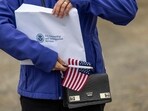 UTQIAGVIK, ALASKA - AUGUST 10: A new American citizen hlds an envelope with her U.S. citizenship certificate following a naturalization ceremony on August 10, 2023 . John Moore/Getty Images/AFP (Photo by JOHN MOORE / GETTY IMAGES NORTH AMERICA / Getty Images via AFP) UTQIAGVIK, ALASKA - AUGUST 10: A new American citizen hlds an envelope with her U.S. citizenship certificate following a naturalization ceremony on August 10, 2023 . John Moore/Getty Images/AFP (Photo by JOHN MOORE / GETTY IMAGES NORTH AMERICA / Getty Images via AFP)