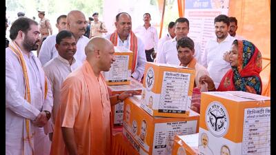 Chief minister Yogi Adityanath distributes relief material to flood-affected victims of Barabanki and Gonda, on Wednesday. (Sourced) Chief minister Yogi Adityanath distributes relief material to flood-affected victims of Barabanki and Gonda, on Wednesday. (Sourced)